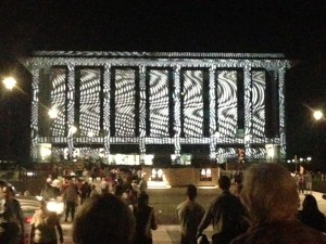 Crowds enjoying the light display on the National Library 
