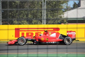 Ferrari driver Kimi Raikkonen sends his car through the slower corners of Albert Park during a practice session.