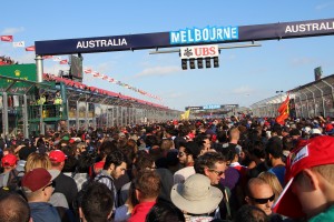 The crowd packs onto the Albert Park main straight, in hope of catching a glimpse of the post race presentation.