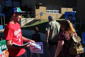 One the many Labor volunteers handing out How-to-vote pamphlets and promoting Whan's cause.