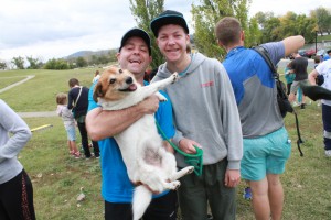 Two participants enjoying a cuddle with their dog before the run began.
