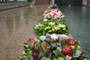 Wreaths line the pool at the War Memorial.