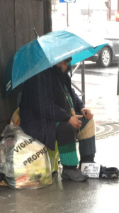 Rain or sun, this man will always be there, sitting on his yellow bags and wearing his multi-coloured pants. 